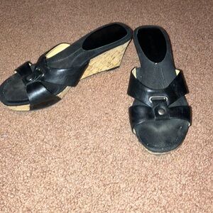 Nine West wedges
Black leather straps 
Cork wedge size 6 1/2 M